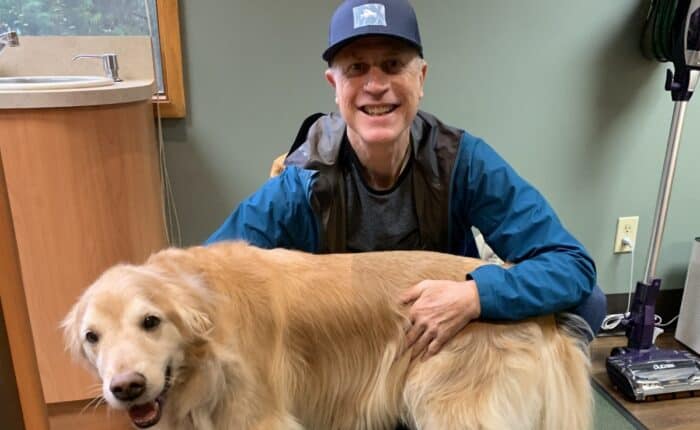 Dental Implant patient with therapy dog Chance